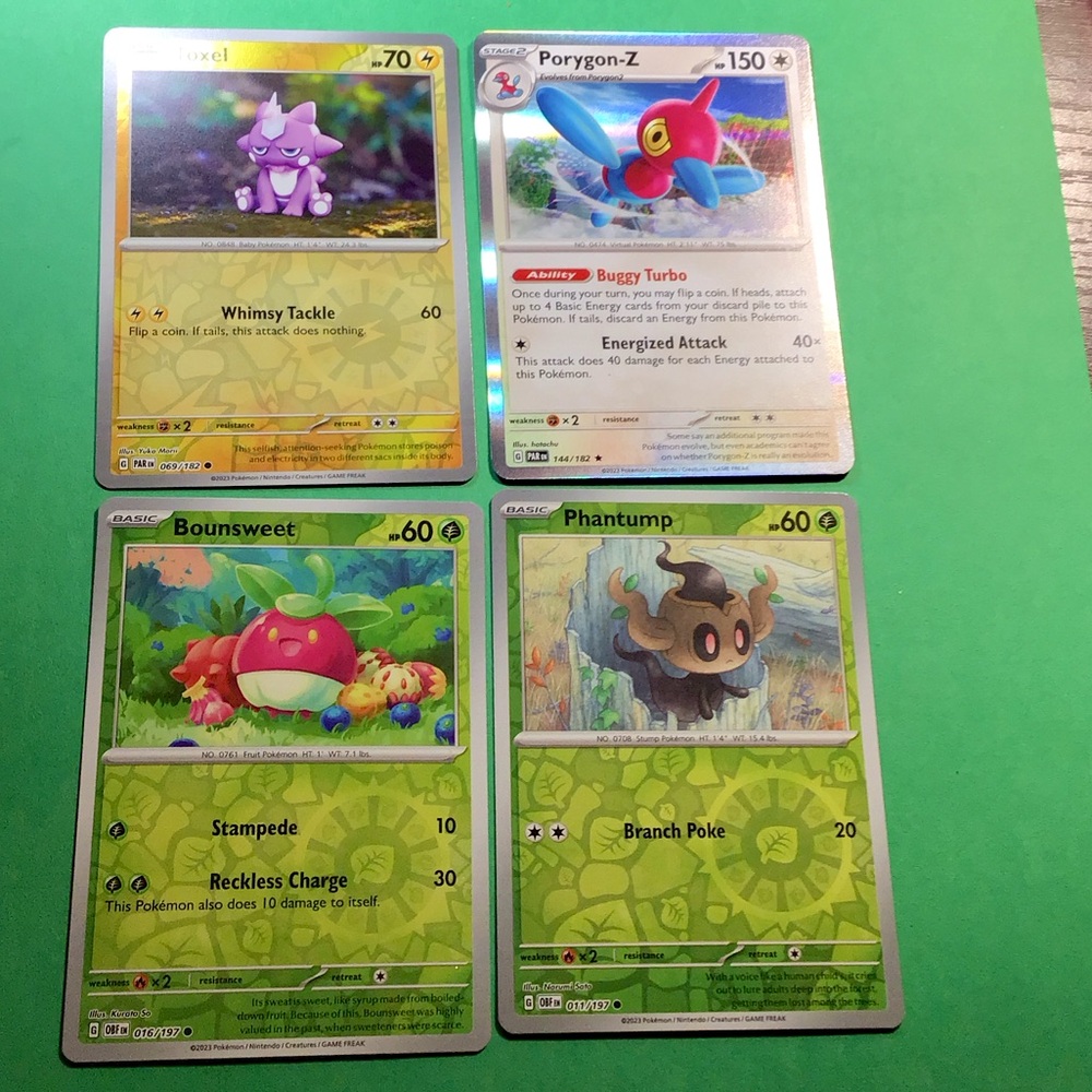 LOT OF 4 DIFFERENT CARDS 1 HOLO & 3 REVERSE HOLO MINT CONDITION KEEP IN SLEEVE